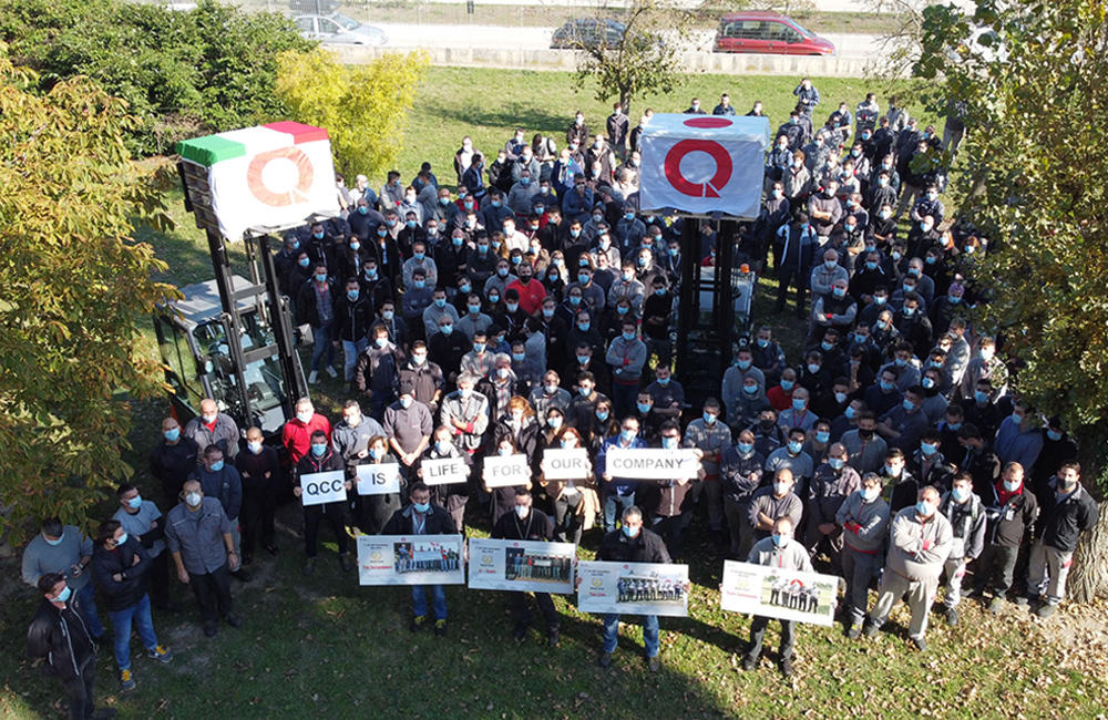 Members engaging in QC circle activities (Italy)