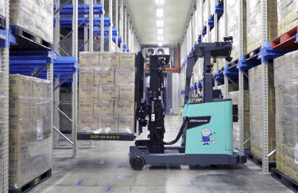 Automated lift truck for practical use in a freezer warehouse